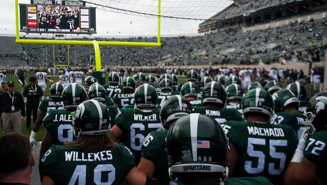 Michigan State Spartans take the field prior to their game against the Michigan Wolverines on Saturday, Oct. 29, 2016 at Spartan Stadium.