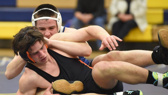 Beacon's Kyle Davis wrestles Pawling's Reece Bijou during Wednesday's match at Beacon High School. Davis won the match by pinning Bijou in the second period.
