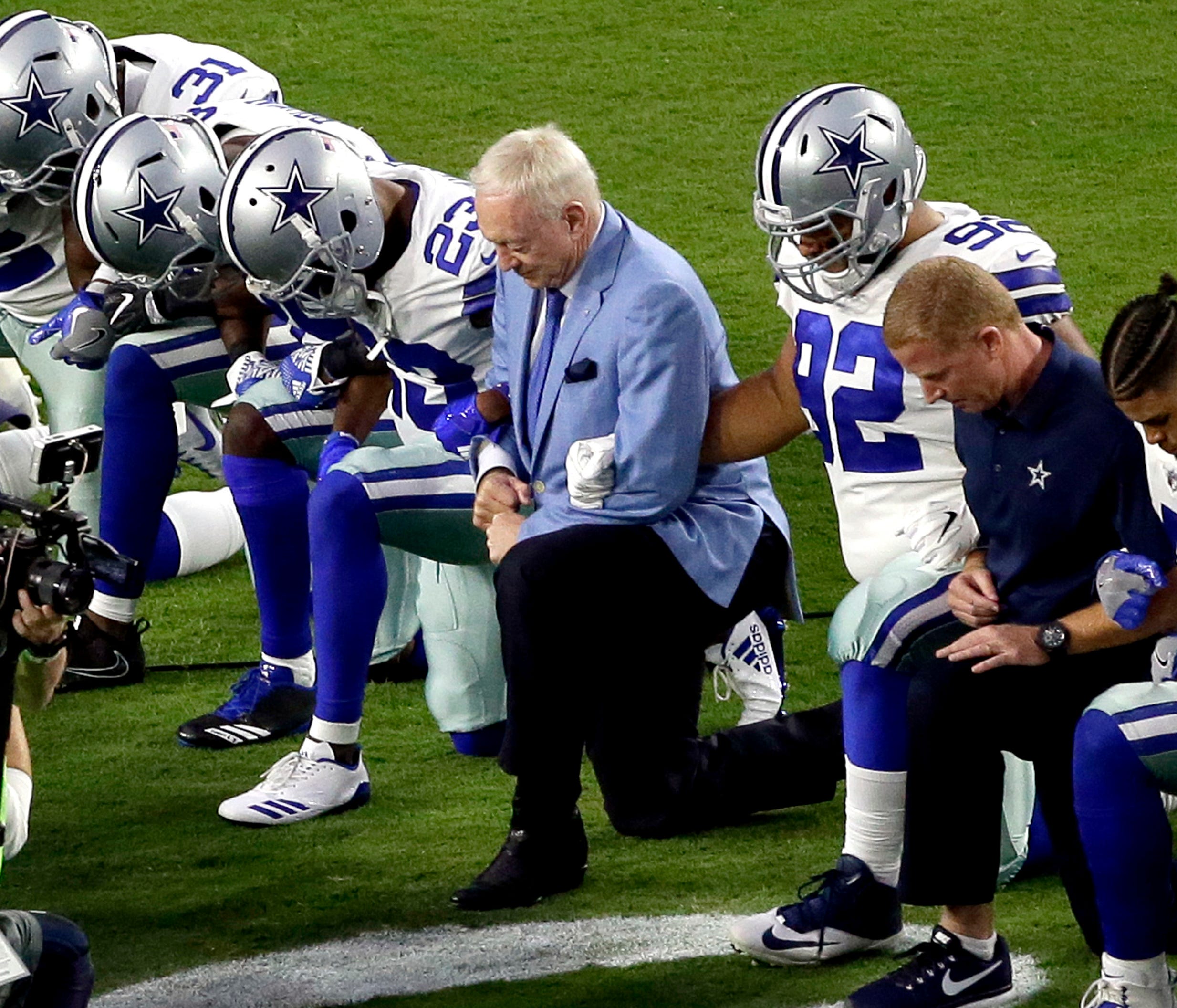 Cowboys owner Jerry Jones and his team took a knee before the anthem on Monday.