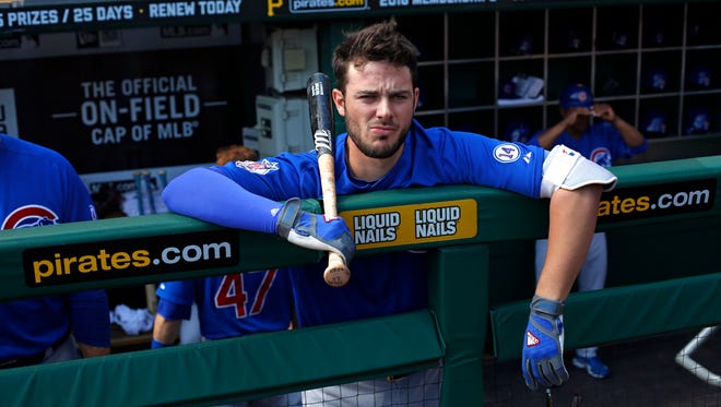 Chicago Cubs' Kris Bryant stands in the dugout before a baseball game against the Pittsburgh Pirates in Pittsburgh, Thursday, Sept. 17, 2015. The Cubs won 9-6.