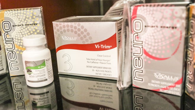 Layoffs, lawsuits at once-hot direct-sales firm ViSalus