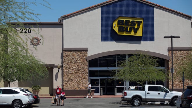 Shoppers exit Best Buy in La Quinta on April 20. In November, La Quinta voters will decide whether the city's sales tax should increase from 8 percent to 9 percent to help boost declining revenues.