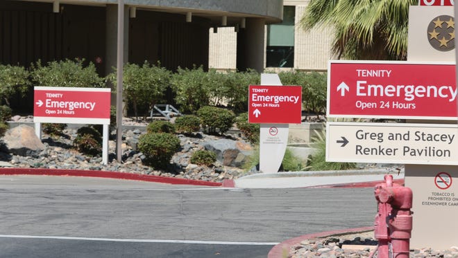 Signs direct patients to the emergency room at Eisenhower Medical Center on Friday, July 22, 2016 in Rancho Mirage.