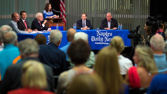 Republican congressional candidates Chauncey Goss and Francis Rooney, seated at right, participate in a primary election forum in the Naples Daily News studio on Monday, Aug. 22, 2016, in North Naples. Dan Bongino declined to participate in the forum.