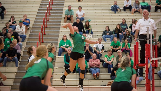 Rhyen Neal goes in for the attack during the first game of the 3A Semi-State game Saturday at Twin Lake High School. Yorktown took the first game in a 3-0 sweep against Ft. Wayne Bishop Dwenger Saints.
