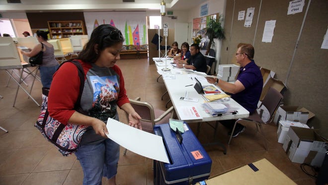 Destiny Delgado, of Indio, casts her ballot at  St. Andrews Presbyterian Church in Indio on Tuesday, June 7, 2016 during the California Primary.