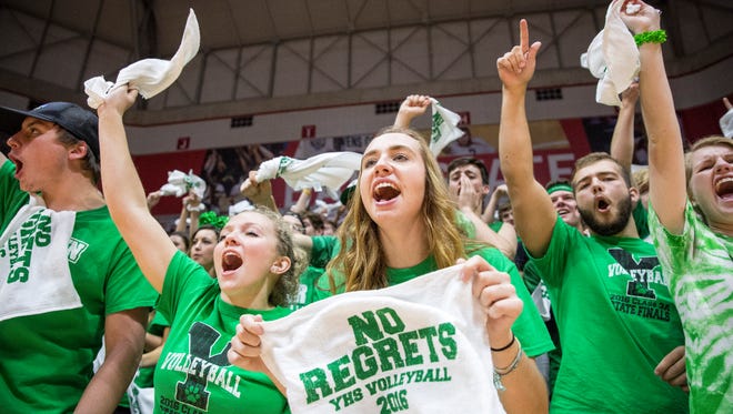 Yorktown fans celebrate the start of the state championship match against Providence Saturday afternoon at Worthen Arena.