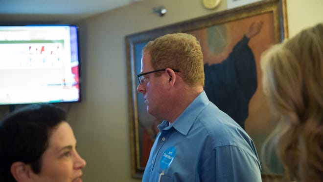 Democrat Jeff Steinborn watches national election coverage in his hotel room at his elections watch party at Hotel Encanto, on Tuesday, Nov. 8, 2016. Steinborn made the successful move from the New Mexico House to Senate with help from conservation super PACs.