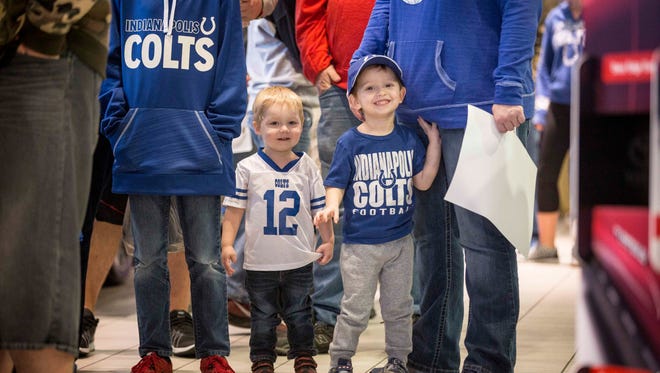 Fans of all ages waited in line for a chance to meet retired Indianapolis Colts player Robert Mathis Tuesday afternoon at an appearance at Toyota of Muncie. Mathis has appeared at the dealership for previous events.