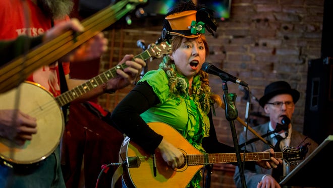 Members of Detroit area band McSpillin' perform during the pub crawl Saturday, March 11, 2017 at Lynch's Irish Tavern in Port Huron.