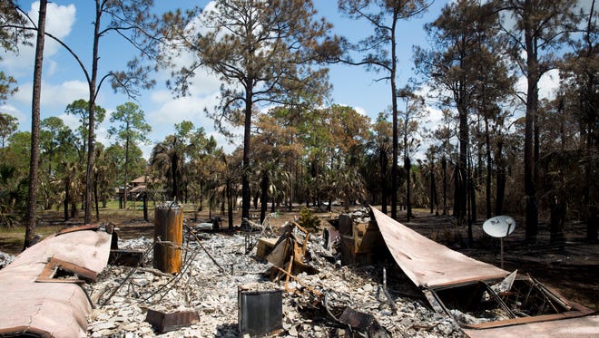 This is all that remained of the Rotondos' home at 2262 Kearney Ave. in Golden Gate Estates on Monday, April 24, 2017, after a brush fire. Lindsey and Tony Rotondo, and their son Antonio III, 4, lost their home while they were celebrating the couples' seventh wedding anniversary at Magic Kingdom in Orlando.