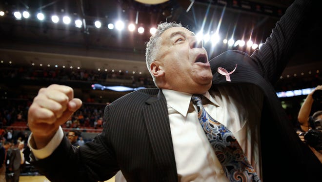 Auburn coach Bruce Pearl cheers after the Tigers' win over Vanderbilt on Feb. 3, 2018.