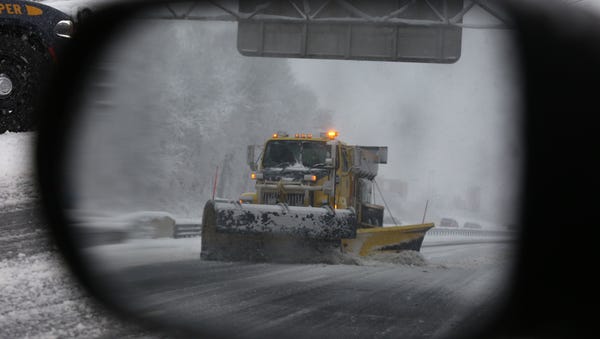 3:26 p.m. A snow plow removes snow on I-287...