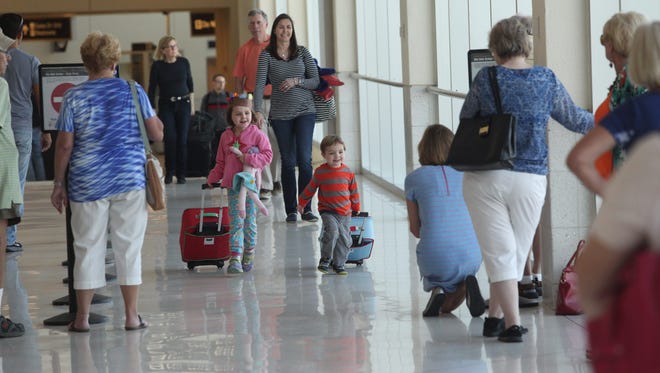 Millions of people are expected to travel for the Thanksgiving holiday.  Here are scenes from Southwest Florida International Airport on Monday 11/24/2014.  