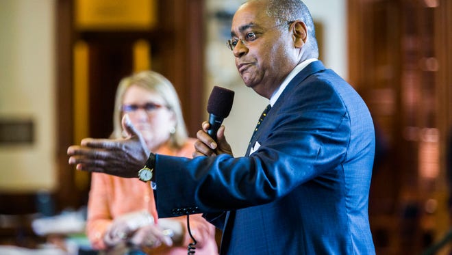 Sen. Rodney Ellis, D-Houston, asks questions about open carry legislation during the final days of the 84th Texas legislature regular session on May 29, 2015 at the Texas state capitol in Austin, Texas.  Open carry in Texas is just a signature away from becoming law, as the House and Senate voted in rapid succession Friday to send the contentious bill to Gov. Greg Abbott. The measure, opposed by most Democrats, would allow licensed Texans to openly carry handguns in belt or shoulder holsters.
