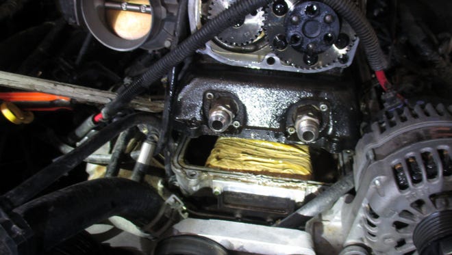 Two bundles of cocaine were discovered in the engine of a 2012 GMC Denali at the Santa Teresa port of entry on Sunday, Feb. 26.