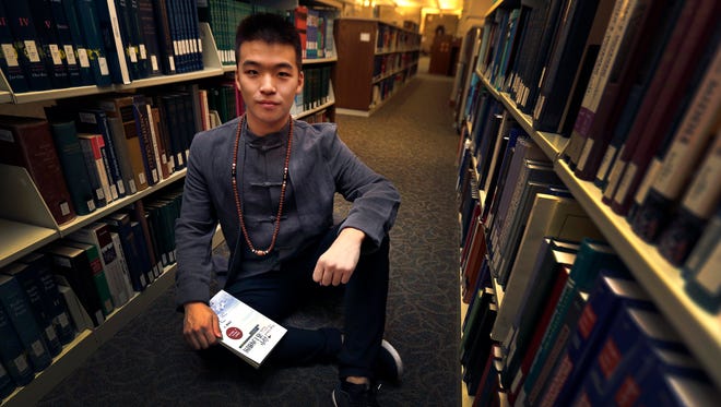 Andy Wang, incoming Lawrence University freshman from China who wrote a book about his experiences as an international student attending school in Seattle and then established a charity from the proceeds of the sale of his book. Wednesday September 7, 2016 in Appleton Wis. Wm. Glasheen/USA TODAY NETWORK-Wisconsin