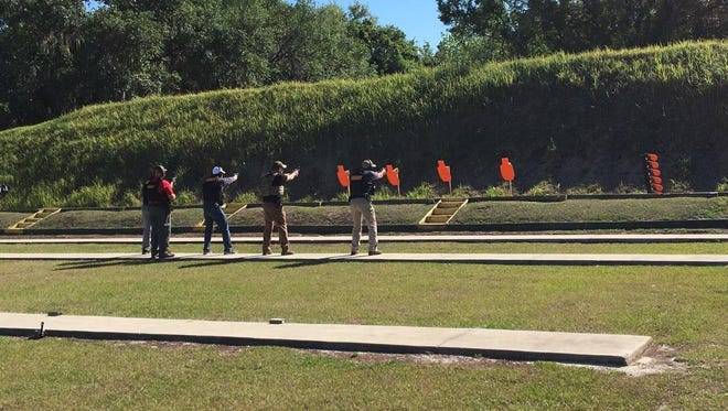 Teachers participate in shooting training in Polk County.