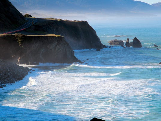 AP SUV OFF CLIFF A FILE USA CA