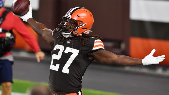 Sep 17, 2020; Cleveland, Ohio, USA; Cleveland Browns running back Kareem Hunt (27) celebrates after catching a touchdown during the first half against the Cincinnati Bengals at FirstEnergy Stadium. Mandatory Credit: Ken Blaze-USA TODAY Sports