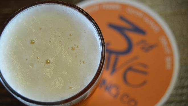 3rd Wave Brewery recommends pairing their Sandstorm Belgian Triple with sweet, buttery candy corn.