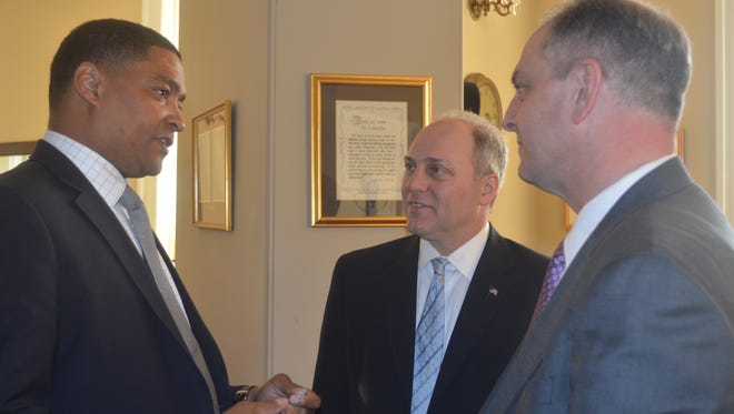 Rep. Cedric Richmond, D-La., Rep. Steve Scalise, R-La., and Gov. John Bel Edwards chat after a delegation meeting Thursday in the U.S. Capitol.
