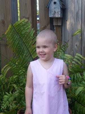 Kacie Francois smiles while battling her first round of leukemia.