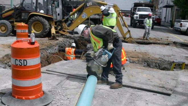 
A Clarksville Gas and Water worker cuts a gas pipe during a construction project downtown. Clarksville is proposing a gas pipeline through Todd County, Ky., with work set to begin in October if the project is approved.
