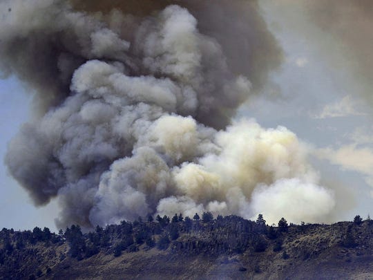 Smoke from the Klamathon Fire billows skyward Friday