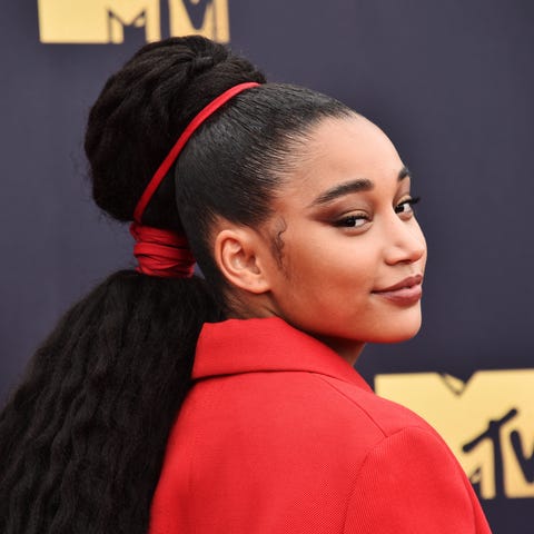 Amandla Stenberg attends the 2018 MTV Movie And...