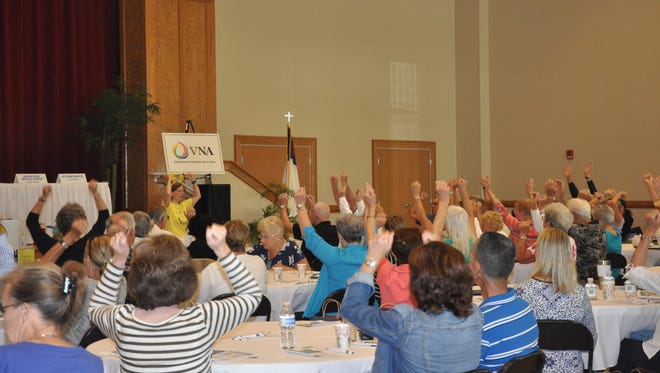Nancy Johnson, certified Laughter Leader, directs laughter and breathing exercises.