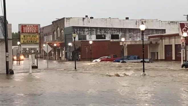 Floodwaters collect on Monday, Aug. 31, 2020, in downtown Waldron.