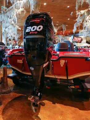 A 200-horsepower motor on the back of a bass boat at Bass Pro Shops on Monday, June 18, 2018. The largest motor allowed in bass tournament is 250-horsepower.