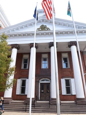 The original entrance to Franklin County Courthouse is off Memorial Square, Chambersburg. This section of the building holds the main court room upstairs and some county offices downstairs.