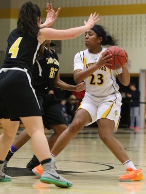 ED PAGLIARINI/CORRESPONDENT
South Brunswick?s Amber Brown is defended by Piscataway?s Brooke Moll during Thursday?s game.