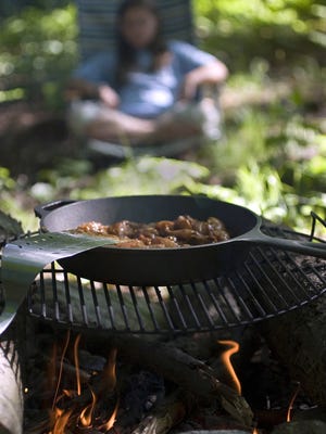 Nothing beats waiting for a meal cooked over open flame at your campsite.