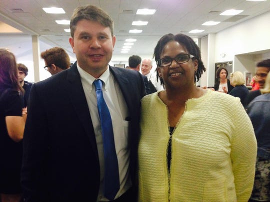 Newly elected Michigan Democratic Party chair Lavora Barnes, right, and former party chair Brandon Dillon.