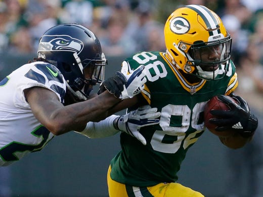 Packers running back Ty Montgomery picks up two yards