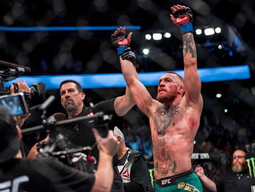 McGregor is declared the winner via majority decision