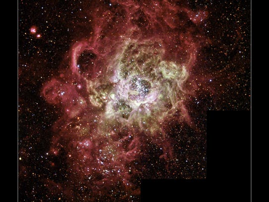 ​Image of stellar nursery NGC 604, where star systems