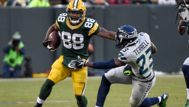 Green Bay wide receiver Ty Montgomery fends off Seahawks safety Steven Terrell during a game at Lambeau Field last month. Terrell is replacing the injured Earl Thomas in Seattle's secondary.