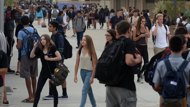 Students arrive for a past first day of school at Oak Park High School. STAR FILE PHOTO