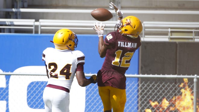 Redshirt sophomore wide receiver John Humphrey (12) catches a pass during the annual spring scrimmage at Sun Devil Stadium in Tempe on Saturday, April 15, 2017.