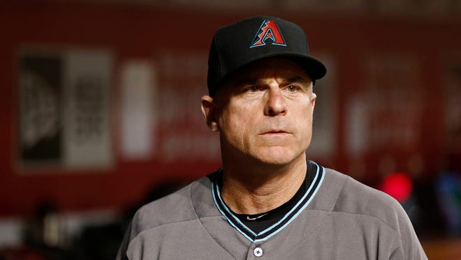 Arizona Diamondbacks manager Chip Hale looks on from the dugout in the eighth inning of a baseball game against the Cincinnati Reds, Friday, July 22, 2016, in Cincinnati.