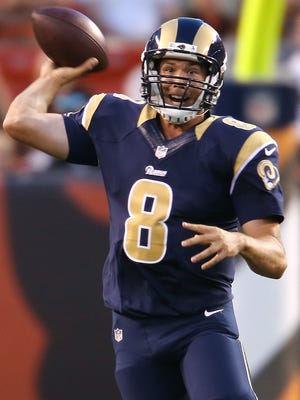 St. Louis Rams quarterback Sam Bradford (8) throws against the Cleveland Browns during the first quarter at FirstEnergy Stadium.