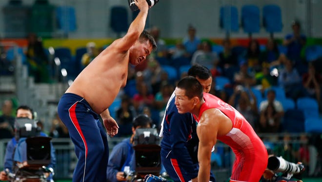 Mongolian wrestling coaches banned 3 years for stripping at Rio Olympics