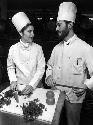 February 23, 1984 - Dolores and Peter Katsotis are getting ready on Feb. 23, 1984, to prepare a table filled with seafood for the preview gala of Madonna Circle's ninth annual Memphis Antiques Show and Sale. The event will be open to the public at the Pipkin Building in The Fairgrounds March 1-4.
