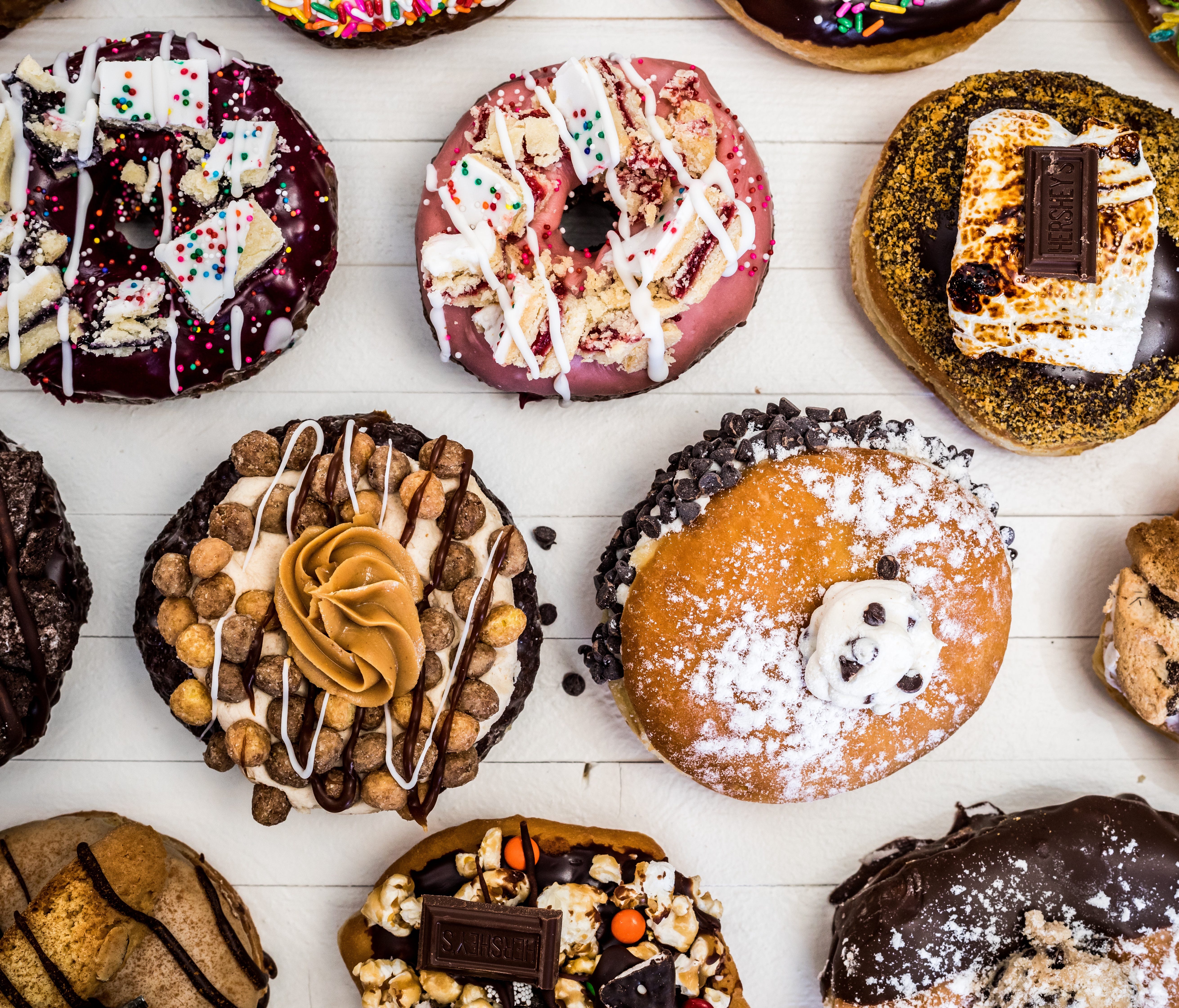 At four Connecticut locations, Donut Crazy crafts more than 20 over-the-top takes on doughnuts with toppings such as chopped peaches rolled in sugar or a piece of Double Bubble gum.