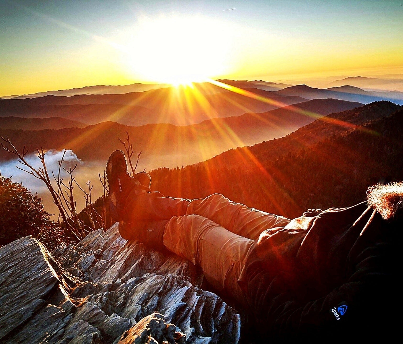 Hiker Benny Braden enjoys a beautiful view at Mount LeConte. The picture was taken while the Sevier County fires were occurring last November when he decided to hike all of the trails in Great Smoky Mountains National Park.