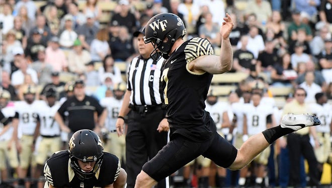 Mike Weaver kicks a field goal against Army on Oct. 29.